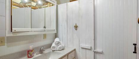 Hair dryer, towels, soap, shampoo