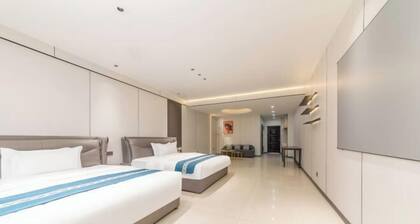 Longcheng Xinyi Apartment Hotel