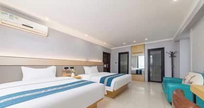 Longcheng Xinyi Apartment Hotel