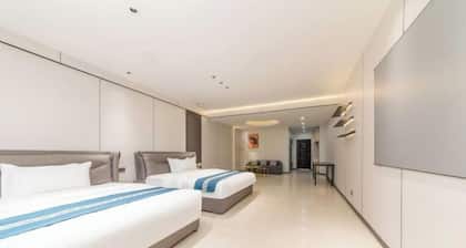 Longcheng Xinyi Apartment Hotel