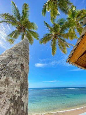 On the beach, sun loungers, beach towels