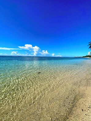 On the beach, sun-loungers, beach towels