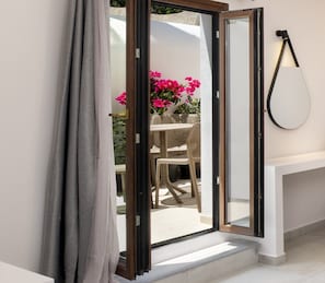 Deluxe Double Room | Terrace/patio - Santorinn Suites (Santorini)