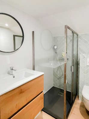 Shower, hair dryer, towels, soap