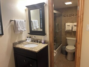 Hair dryer, towels, soap, shampoo