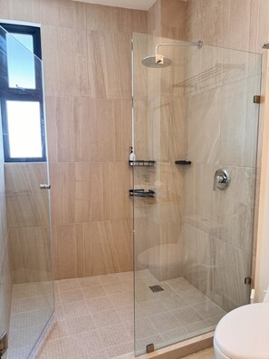 Shower, hair dryer, towels, soap