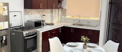 Fridge, microwave, oven, coffee/tea maker