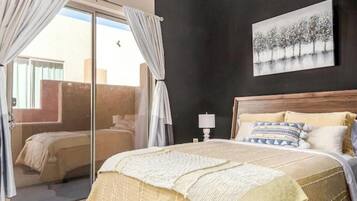 2 chambres, coffre-fort, fer et planche à repasser