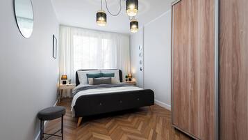 Family Apartment, City View | 1 bedroom, in-room safe, individually decorated, individually furnished