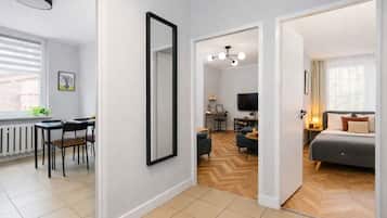 Family Apartment, City View | Living area | 50-inch Smart TV with cable channels, Netflix, streaming services