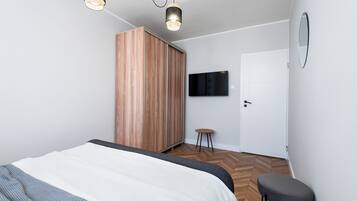 Family Apartment, City View | 1 bedroom, in-room safe, individually decorated, individually furnished