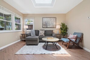 Smart TV, fireplace, books, offices