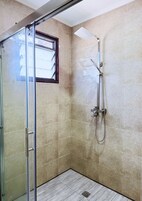 Shower, free toiletries, towels, soap