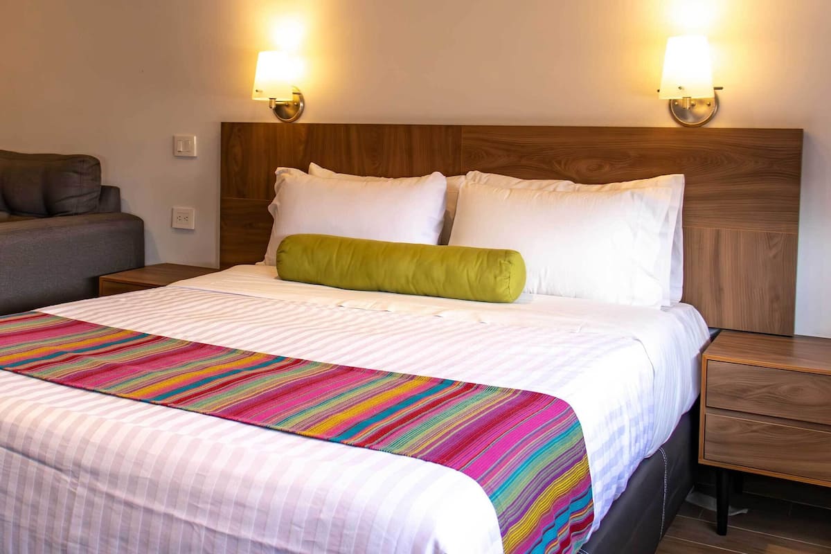 Standard Studio Suite | In-room safe, desk, blackout drapes, iron/ironing board