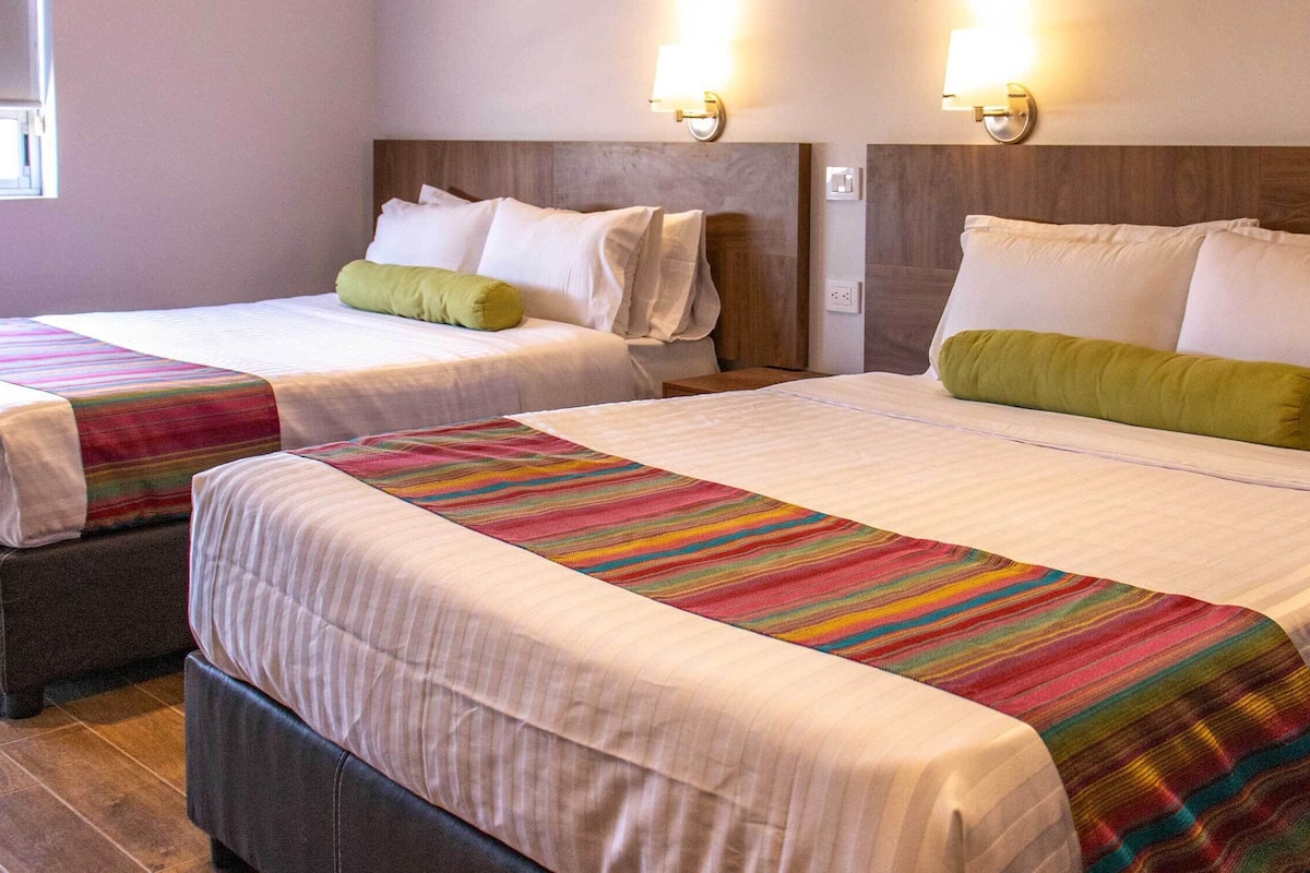 Family Studio Suite | In-room safe, desk, blackout drapes, iron/ironing board