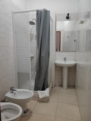 Hair dryer, bidet, towels, soap