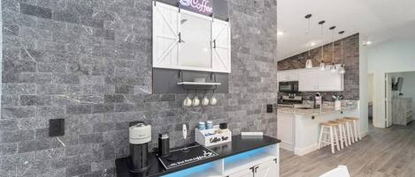 Coffee/tea maker, fridge, microwave, oven