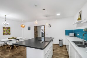 Fridge, microwave, stovetop, coffee/tea maker