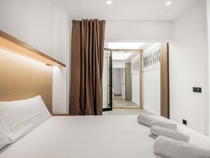 2 habitaciones, tabla de planchar con plancha, wifi y ropa de cama
