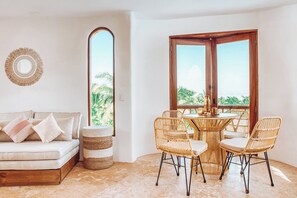 Deluxe Suite, Balcony, Garden View | Individually decorated, individually furnished, iron/ironing board