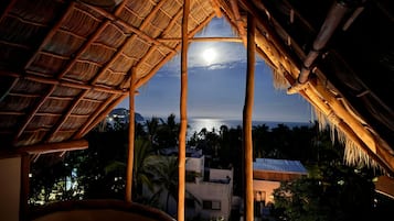 Penthouse panorámico, vista al océano | Vista a la playa o el mar