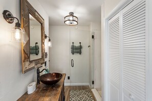 Shower, towels, soap, toilet paper