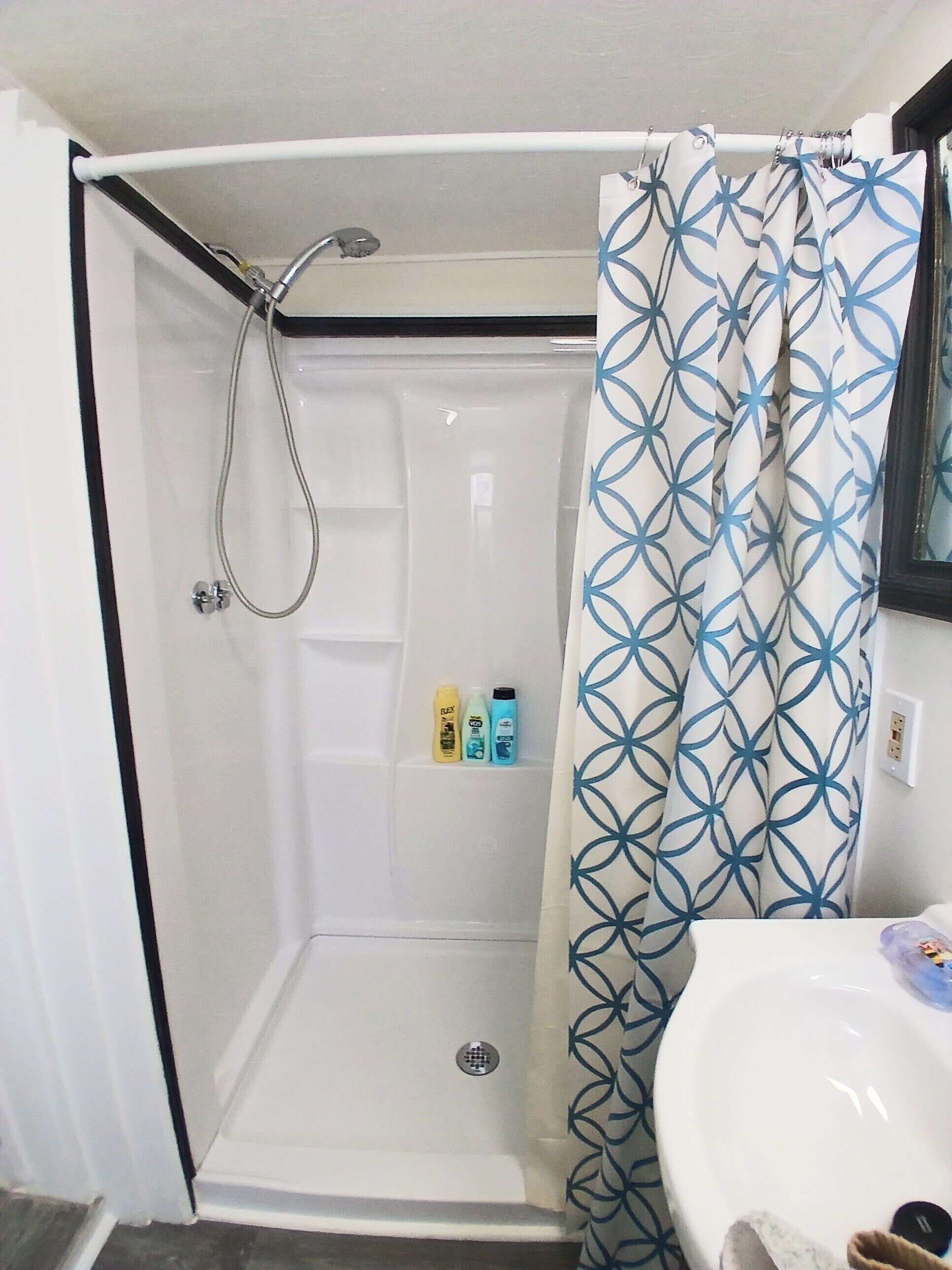 Shower, hair dryer, towels, toilet paper