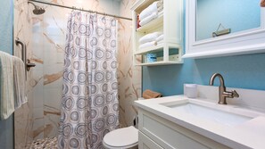 Shower, hair dryer, towels