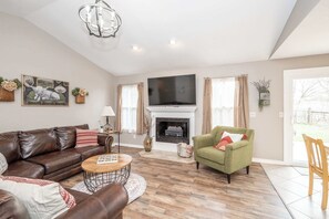 House, Multiple Beds, Patio, Garden View (Main Street Cottage) | Living area | 42-inch flat-screen TV with digital channels