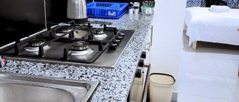 Microwave, oven, stovetop, cookware/dishes/utensils