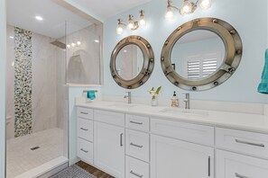 Shower, hair dryer, towels