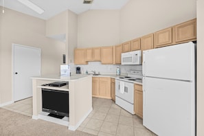 Coffee/tea maker, fridge, microwave, oven