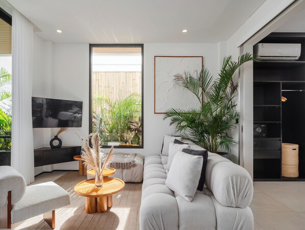 Deluxe Apartment | Living room | 43-inch Smart TV with digital channels