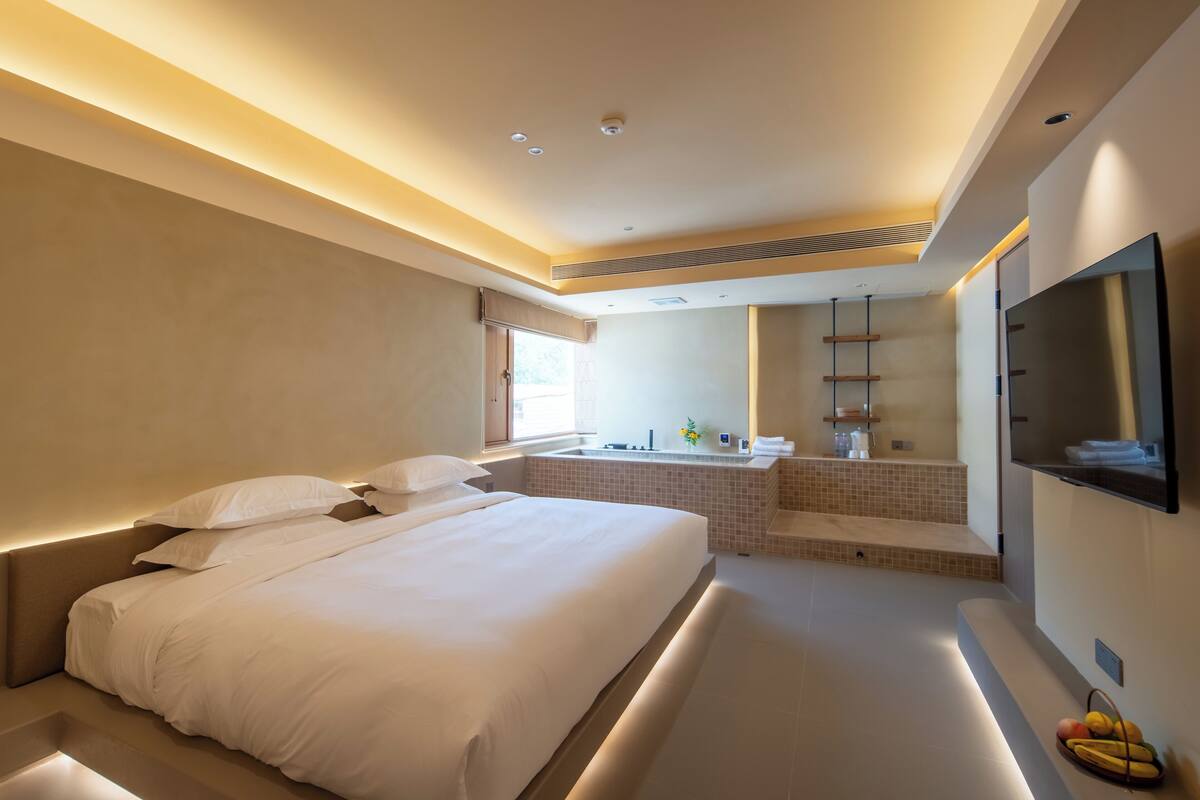Premium bedding, down comforters, blackout drapes, soundproofing