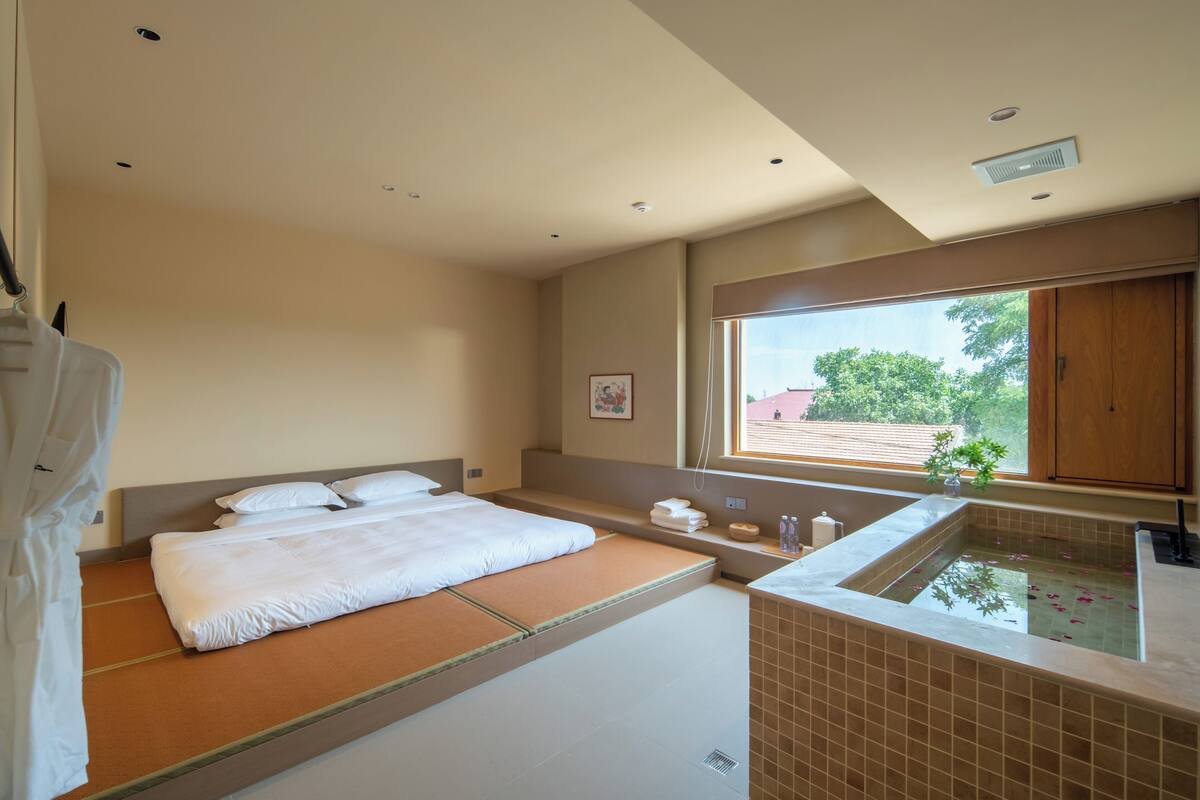 Premium bedding, down comforters, blackout drapes, soundproofing