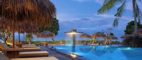 Outdoor pool, open 6:00 AM to 9:00 PM, pool umbrellas