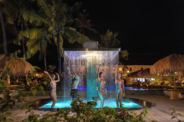 Outdoor pool, open 6:00 AM to 9:00 PM, pool umbrellas