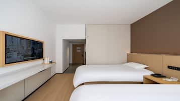 Eenvoudige Twin kamer | Verduisterende gordijnen, een strijkplank/strijkijzer, gratis wifi