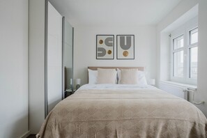 1 slaapkamer, een strijkplank/strijkijzer, wifi, beddengoed