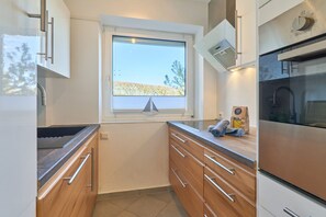 Réfrigérateur, four, plaque de cuisson, lave-vaisselle