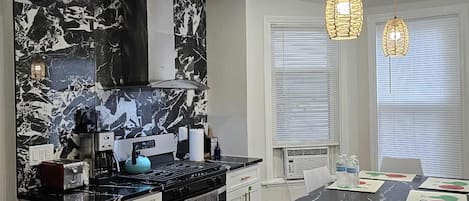 Coffee/tea maker, fridge, microwave, oven