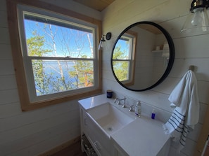 Shower, towels, soap, toilet paper