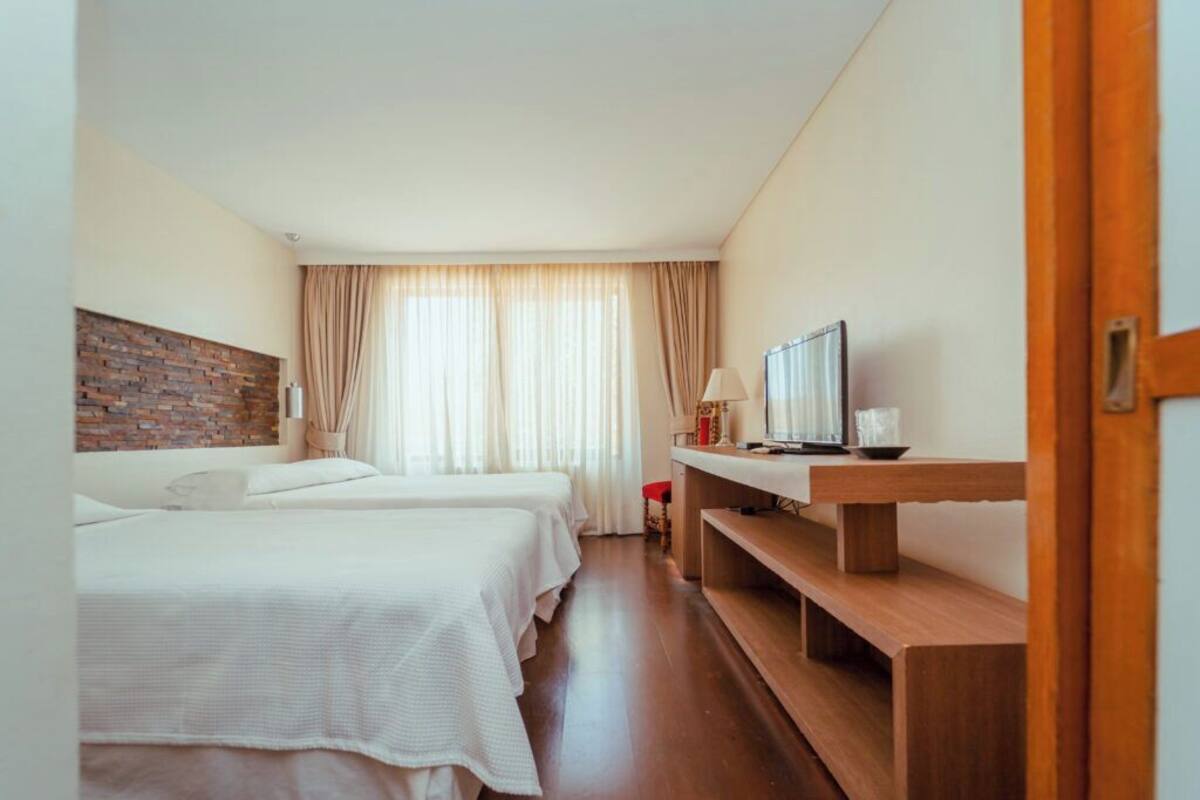 Habitación superior | Cortinas opacas, wifi gratis, ropa de cama