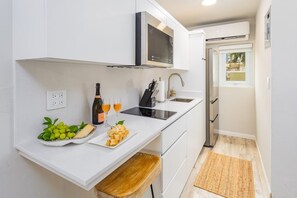 Fridge, microwave, coffee/tea maker, toaster