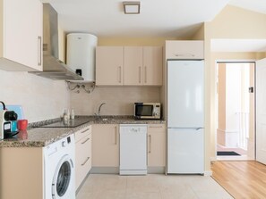 Fridge, microwave, coffee/tea maker, toaster