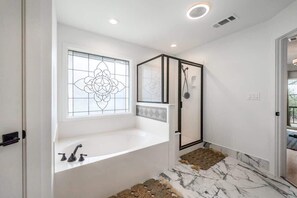 Shower, hair dryer, towels, shampoo