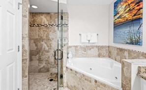 Shower, hair dryer, towels, shampoo