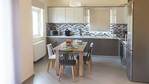 Apartment, 3 Bedrooms, Balcony, Garden View | Dining room - Tzei House - 5min Drive to Beach (Chania)