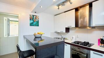Classic Apartment | Private kitchen | Fridge, oven, dishwasher, espresso maker