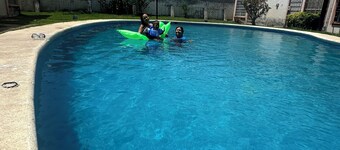 "Cozy house with pool and amenities.